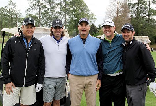 From left, Brian Shell, John Davis, Mike Delrocco, Jason Finley and Paul Tesori, PGA Caddy for Webb Simpson, at Corner Lot Properties' golf tournament to benefit Blessings in a Backpack.