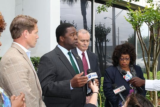 From left, JAX Chamber President and CEO Daniel Davis, Jacksonville Mayor Alvin Brown, JaxPort CEO Brian Taylor and U.S. Rep. Corrine Brown, D-Fla., at the news conference where officials announced the port received approval to deepen the channel to 4...