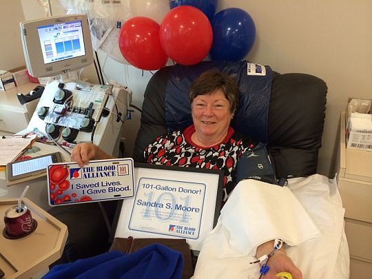 Sandra Moore has donated 101.5 gallons of blood. She is one of only six local donors to reach the milestone and the first woman.