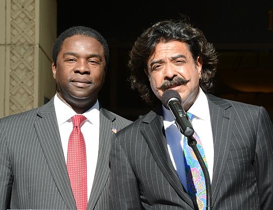 File photo of Mayor Alvin Brown and Jacksonville Jaguars owner Shad Khan