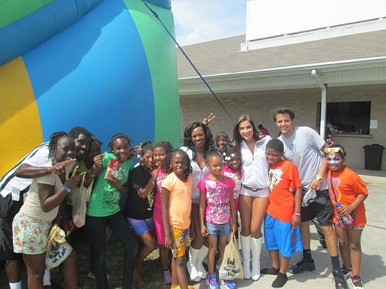 With the help of 19 volunteers from Citibank and Prudential, 50 students enjoyed arts and crafts, a bounce house, carnival games, tennis activities and a live DJ on Saturday at the MaliVai Washington Youth Center. Elementary school students in the Mal...
