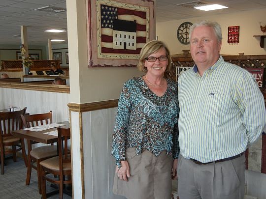 Josephine and John Phelan opened their seventh Famous Amos on Wednesday in North Jacksonville.