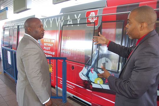 Left, JTA CEO Nathaniel Ford and Senior Manager of Skyway Operations Harold Sams, who was on the testing team before the automated mass transportation system opened in 1989.