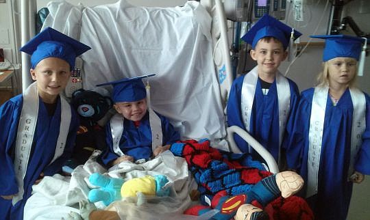 Keegan Davis, 4, was able to graduate with some of his classmates during a special ceremony at Wolfson Children's Hospital.