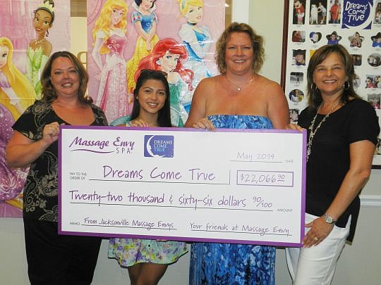 From left, Johanna Logue, with Massage Envy; Dreamer Andrin, whose Hawaii dream in August is being sponsored by Massage Envy's donation; Sue Kowalewski, Regional Developer with Massage Envy; and Sandy Flaschner with Massage Envy.