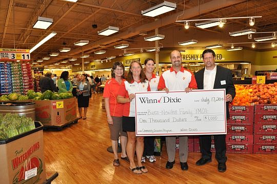 Winn-Dixie presented a $1,000 check to Barco-Newton Family YMCA.