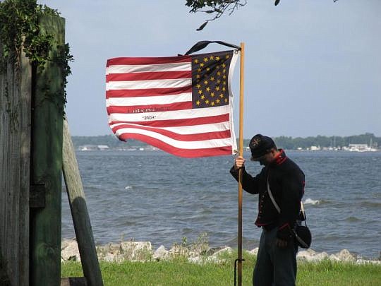 Fort Caroline National Memorial hosts several events, including this Civil War encampment at St. Johns Bluff to commemorate the battles for the bluff and war activities on the St. Johns River. Above is the flag of the 3rd Rhode Island Artillery.