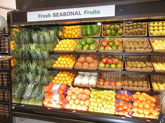 Earth Fare was stocking its seasonal fruits and other produce Monday in anticipation of opening Wednesday.
