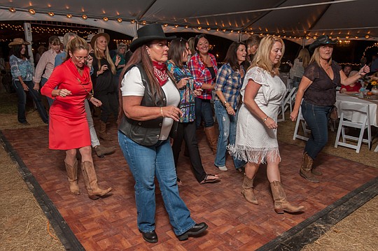 The Southwest Council of the Northeast Florida Association of Realtors held its country shindig get together at Tucker's Farmhouse in Green Cove Springs. Many of the guests got up and line danced to songs played by the J-Collins Band.