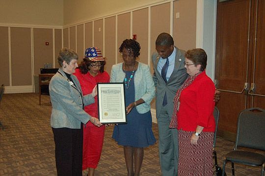 From left, Jacksonville Public Library Director Barbara Gubbin; U.S. Rep. Corrine Brown; library Board of Trustees Chair Brenda Simmons-Hutchins; Tony Hill, Mayor Alvin Brown congressional affairs director; and Kathleen Krizek, coordinator of the Fede...