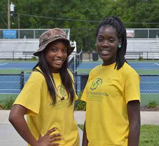 High-school students Antonia Bell (left) and Shavonna Davis earned a trip to the U.S. Open Tennis Championships in New York City by earning 4.0 GPAs last school year.
