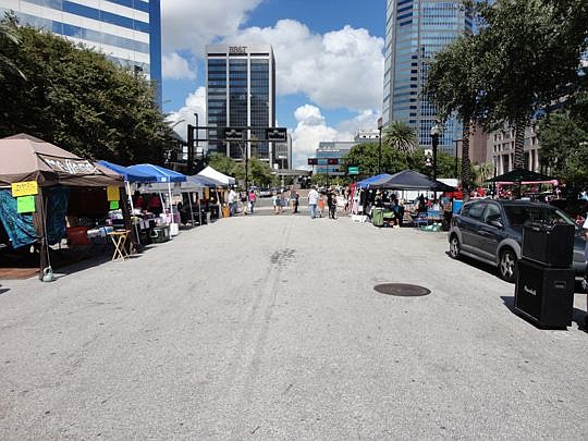 Community First Saturday was set up along the Northbank Riverwalk and in the Hogan Street cul-de-sac in 2013 (above) before moving last year to the JAX Chamber parking lot along East Bay Street.