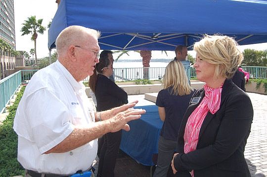 Captain's Club Vice Commodore Bob Gipson and Missy Peters, Community First community affairs manager.