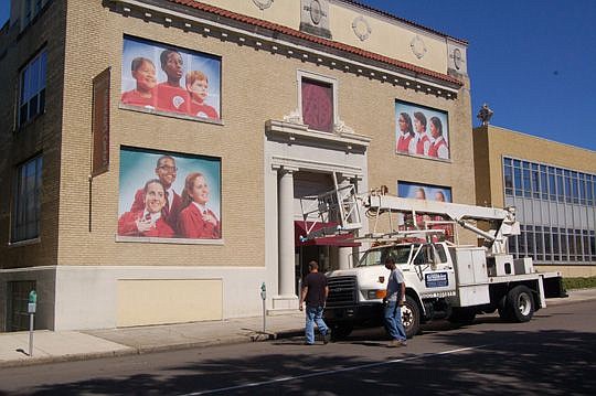 Four window shade murals were installed Thursday on The Jacksonville Children's Chorus building at 225 E. Duval St. They were paid for by a donor who wants to remain anonymous.