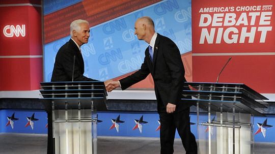 Polls show Charlie Crist and Gov. Rick Scott are deadlocked two weeks before the Nov. 4 election. (Photo from news4jax.com)