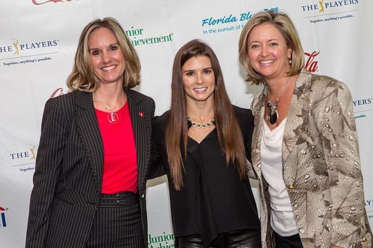 Marie Perry (left) and Robin Wahby met Danica Patrick before Thursday's Junior Achievement luncheon. (Photo by Bobby King)