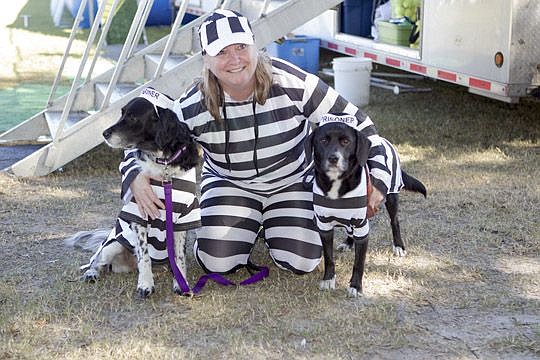 Susan Roche dressed up with Diva and Dakota for the Dogtoberfest costume contest. (Photos by Bobby King)