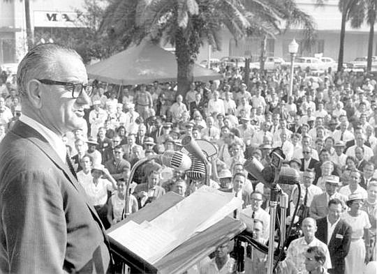 President Lyndon Johnson was on the campaign trail in October 1964. While he was making a speech in Hemming Park, a man carrying two concealed firearms was arrested nearby. (Photo from floridamemory.com)