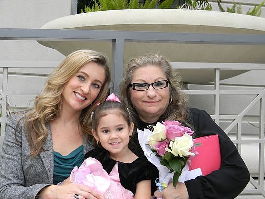 Attorney Jennifer Kifer (left) served as a pro bono attorney to help Gina get custody of her 2-year-old great-granddaughter, Isabella.