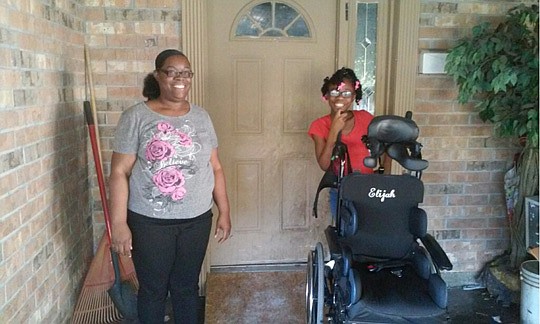 Elijah's mother and sister appreciate the changes to their home that make it possible for Elijah to move about more freely.