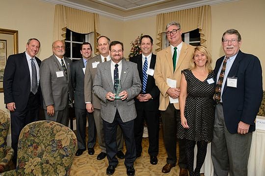 From left, Mike Rudolph, Judge Bill Dane, Rob Williams, Judge Ray Holley, Alan Gordon, John Rahaim, Mike Crumpler, Vanessa Herbert and Jake Schickel at the annual holiday dinner of the E. Robert Williams Inn of Court. Gordon received the John J. Schic...