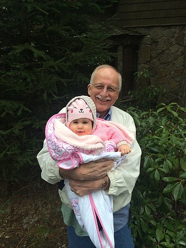 Mike Hightower and his granddaughter, Gracie, at the family's home in Highlands, N.C.