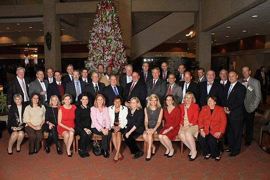 The 35th annual Bench and Bar holiday party was held Wednesday in the lobby of the Wells Fargo Center. It's an opportunity for attorneys and judges to socialize outside the courthouse. This year's event was the final one for Chief Judge Donald Moran J...