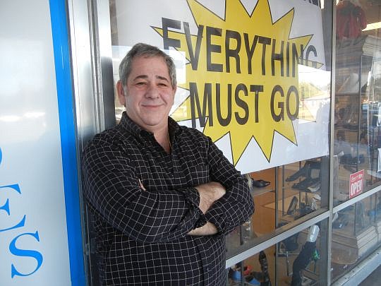 Phil's Shoes President Mark Lewis started a store-closing sale Monday. The third-generation owner says the economy as well as competition from department and big-box stores and the Internet led him to step out of the 54-year-old business.