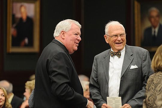 Former Supreme Court Justice Major Harding, right, attended the retirement ceremony of Chief Judge Donald Moran this month.