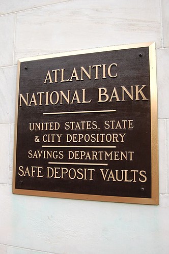 There are no longer safe deposit boxes or government depositories, but this plaque outside 121 W. Forsyth St. commemorates the building's original tenant, the Atlantic National Bank.