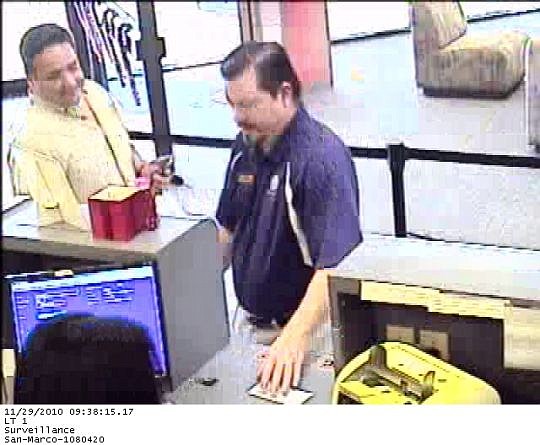 Nelson Cuba and Robbie Freitas are shown on bank surveilance cameras making transactions from what officials called shell  companies.