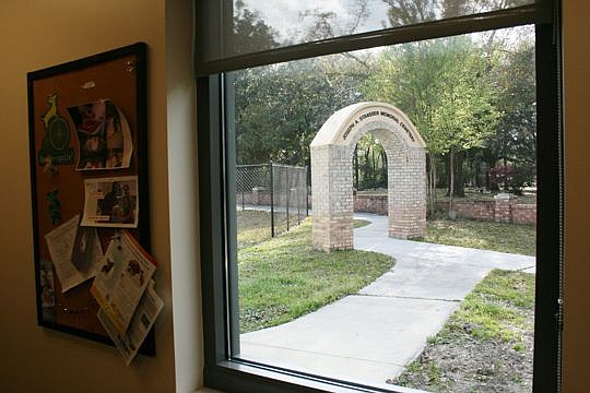 The view outside this window in the vets' office is a reminder of the toughest part of the job: The Joseph A. Strasser Memorial Cemetery, where more than 1,000 beloved pets are buried.