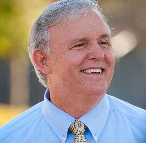 Mike Hogan won the race for supervisor of elections.