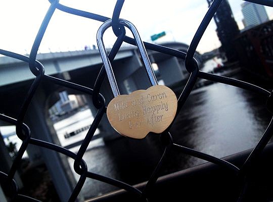 This "love lock" was placed more than one year ago on the fence along the Northbank Riverwalk near the Acosta Bridge. About 30 were removed by city employees.