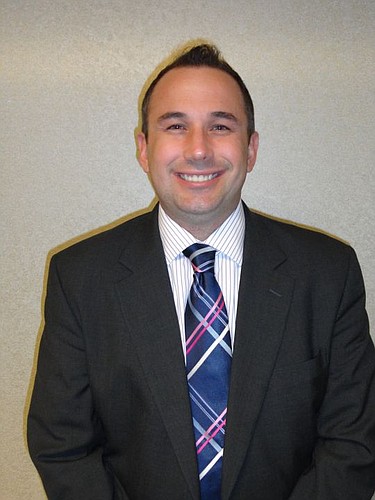 Jacob Gordon was hired as executive director of Downtown Vision Inc.
