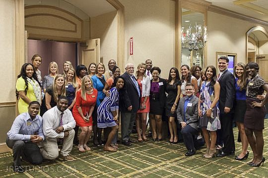 The staff from Big Brothers Big Sisters of Northeast Florida celebrated the organization's 100 years of service to the community.