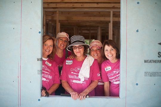 From left, Gail George, Shelley Nemethy, Margherite Myers, Vicki Wilder and Erin Mount, members of the Davidson Realty team who helped build a Habitat for Humanity house in St. Augustine.