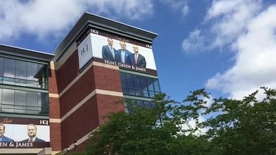 Signs advertising Hunt, Green & James law firm have been removed from Jacksonville Veterans Memorial Arena.