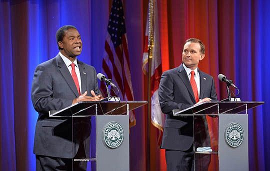 Mayor Alvin Brown, left, makes his opening statement as Lenny Curry listens during the mayoral debate held Thursday at Jacksonville University. (Photo by Bruce Lipsky / The Florida Times-Union)