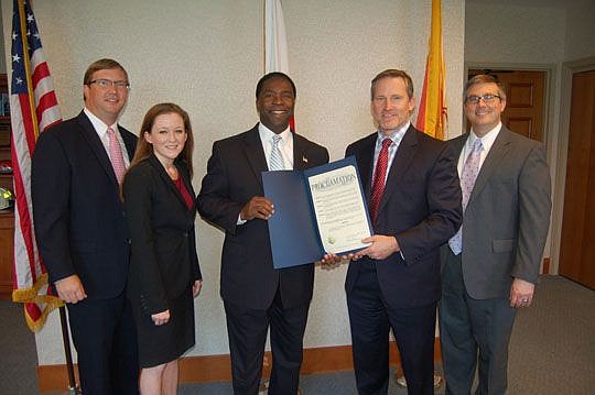 Members of The Jacksonville Bar Association Law Day Committee met Mayor Alvin Brown, center, at City Hall on April 30 for the presentation of the document proclaiming May 1 as Law Day in Jacksonville. From left, John Wallace, Emily O'Leary, Brown, Jac...