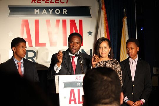 With sons, Joshua and Jordan, and wife, Santhea by his side, Mayor Alvin Brown addresses supporters Tuesday night following his Election Day defeat. He thanked the volunteers, supporters and city staff who had made the past four years possible and sai...