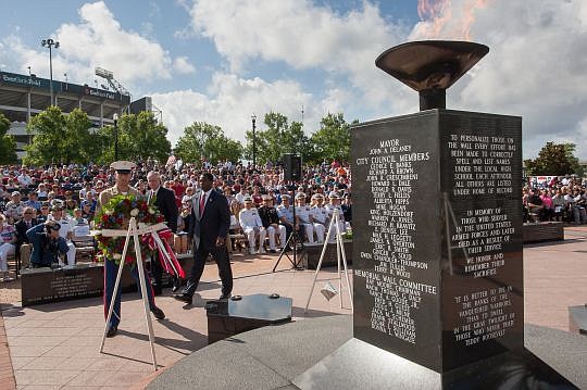 Memorial wreaths were presented for each branch of the military during Monday's annual city observance at the Veterans Memorial Wall.