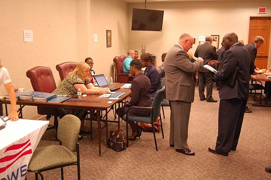 One of the first orders of business for new council members was applying for city badges and parking permits. They also enrolled for health insurance and received their coj.net email addresses.