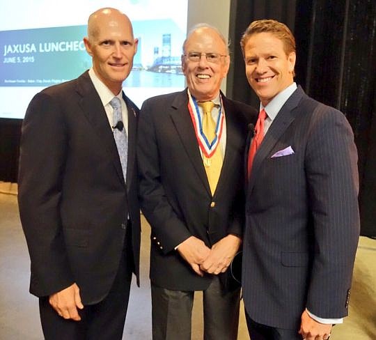 Gov. Rick Scott, Preston Haskell and Daniel Davis, president of the JAX Chamber, after Haskell received the Distinguished Eagle Scout Award from the North Florida Council and Boy Scouts of America.