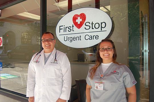 Rick Albarran, an advanced registered nurse practitioner, and  Stephanie Weiser, a radiological technician and medical assistant, treat patients at First Stop Urgent Care, Downtown's new walk-in medical clinic.