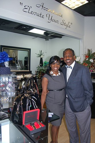 Ramona and Michael Cobb opened Accentuate, a specialty fashion accessory store, this month at the Jacksonville Landing.