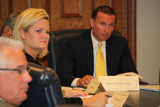 Mayor Lenny Curry and Chief of Staff Kerri Stewart listen to reports from transition team members. At left is Frank Mackesy, who provided remarks from "A Safer Jacksonville."