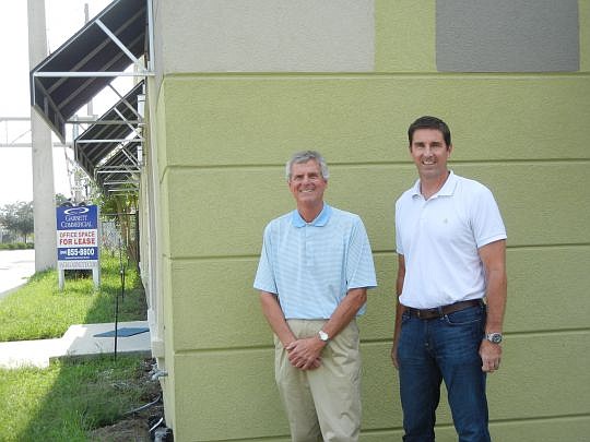 John Carey and Marc Munago of Whitehall Realty Partners are moving the company today to 1721 Atlantic Blvd.