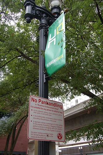 Notices that panhandling is against the law are posted in several locations Downtown.