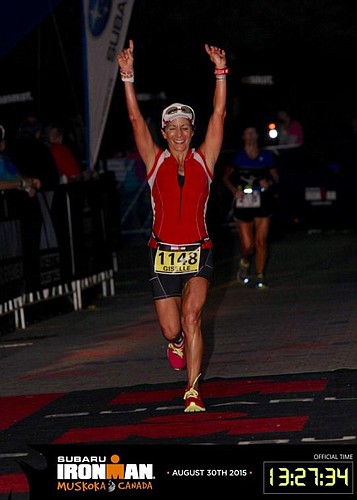 Giselle Carson crossing the finish line at the Ironman Muskoka in Ontario, Canada.